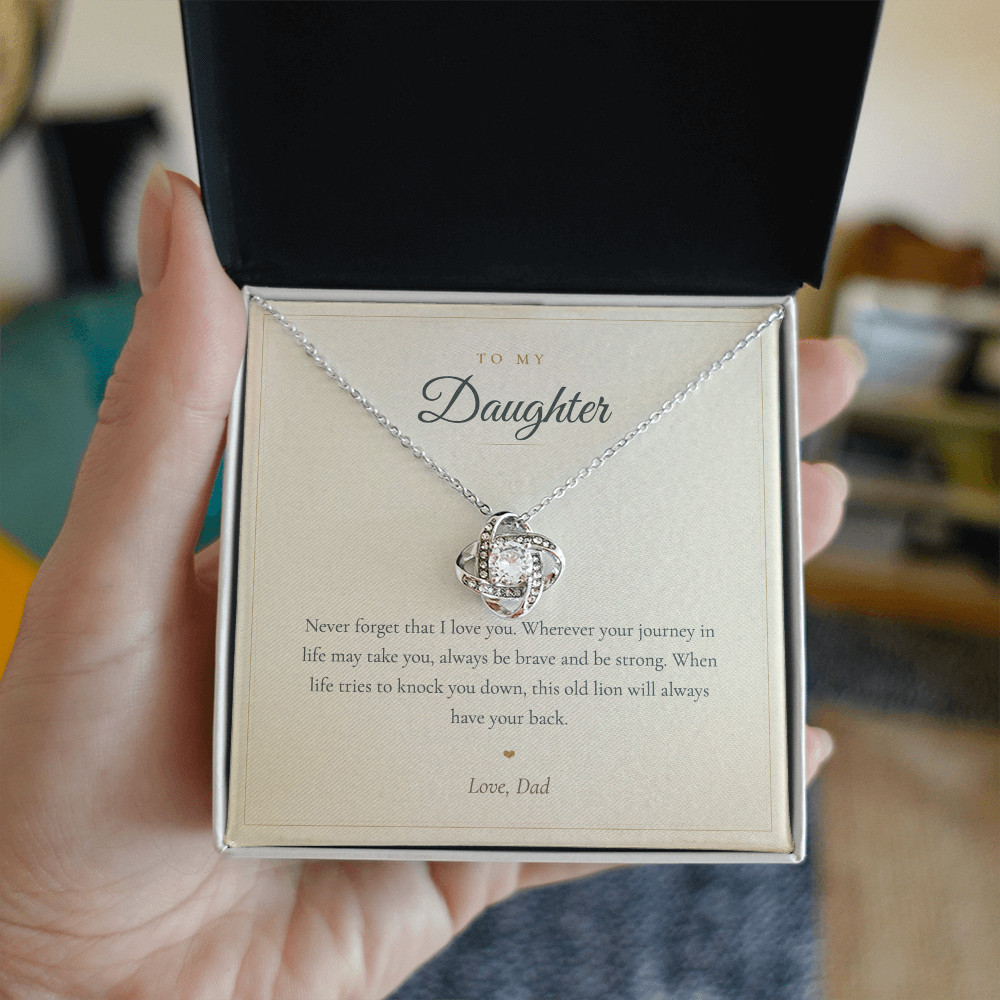 Daughter from Dad love knot necklace on the message card styled with red roses