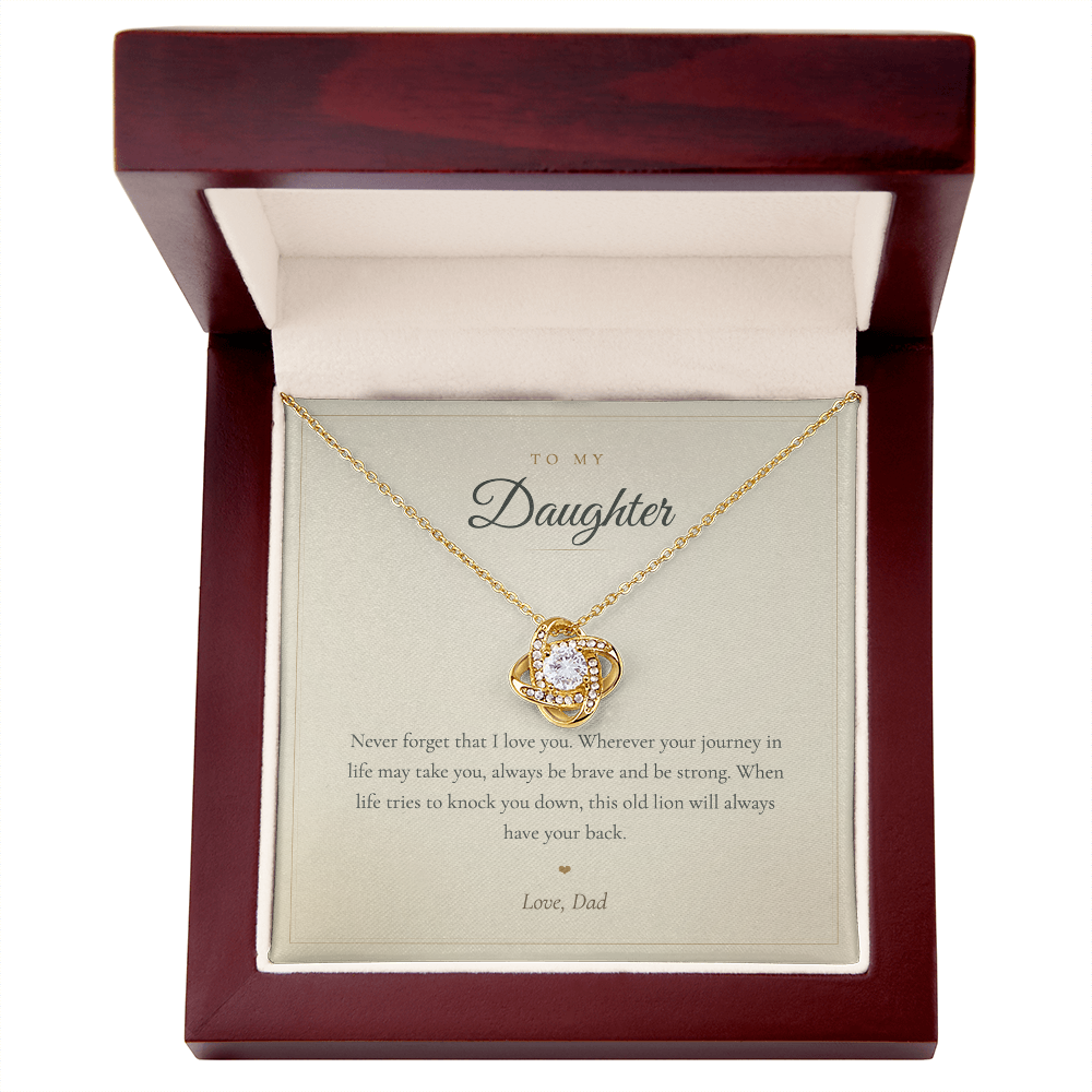 Gold love knot necklace on the To My Daughter from Dad message card