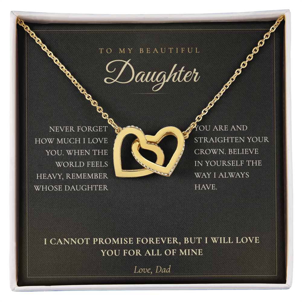 Gold interlocking hearts necklace on the black To My Daughter from Dad message card