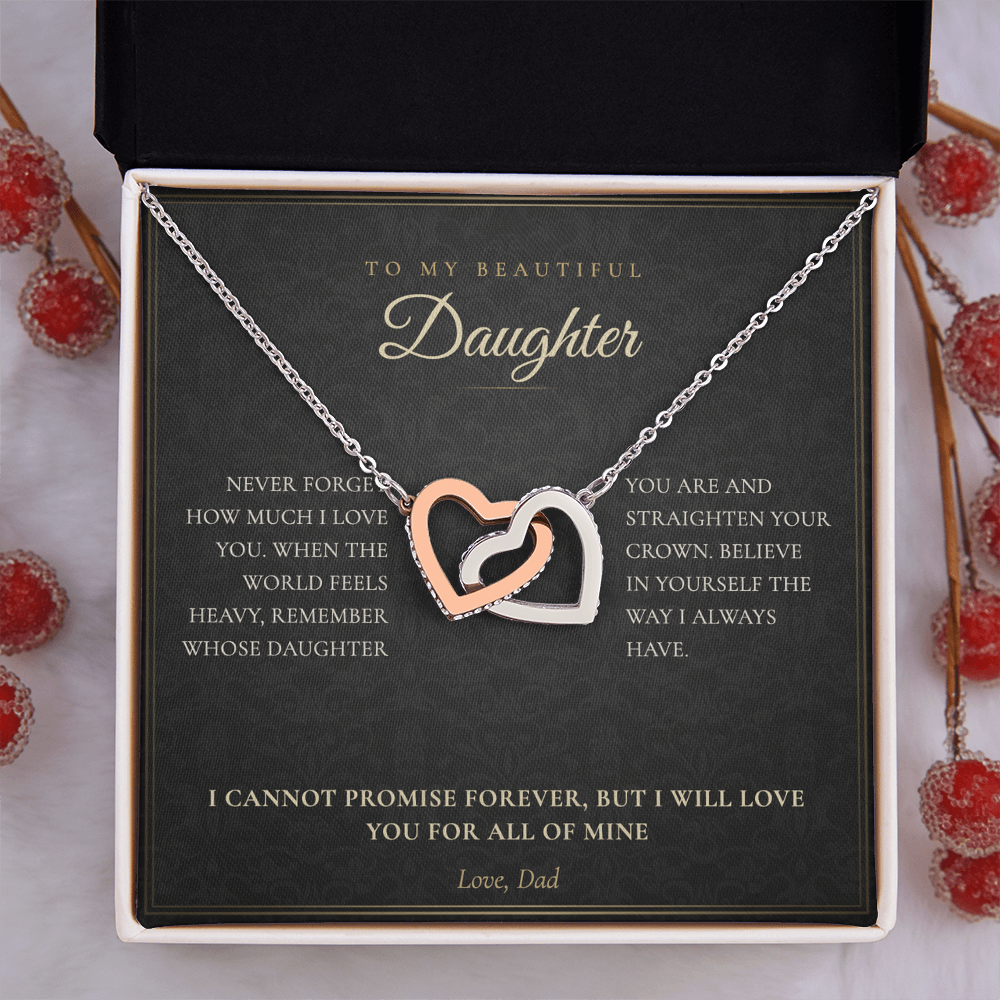 Gold interlocking hearts daughter necklace in an open mahogany LED gift box