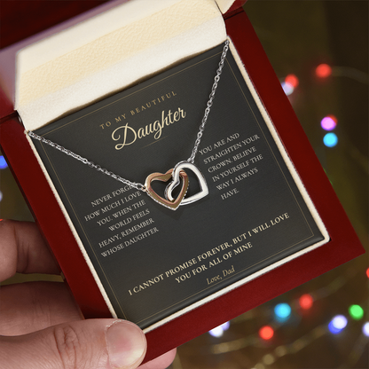 Hand holding the father daughter necklace gift box with the keepsake card